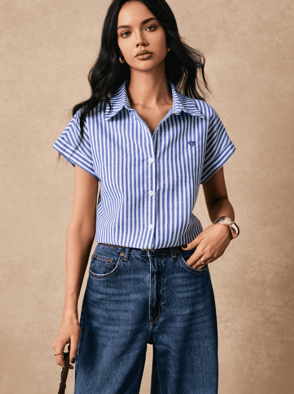 Spring outfit with a striped shirt paired with white shorts for a trendy and casual seasonal look